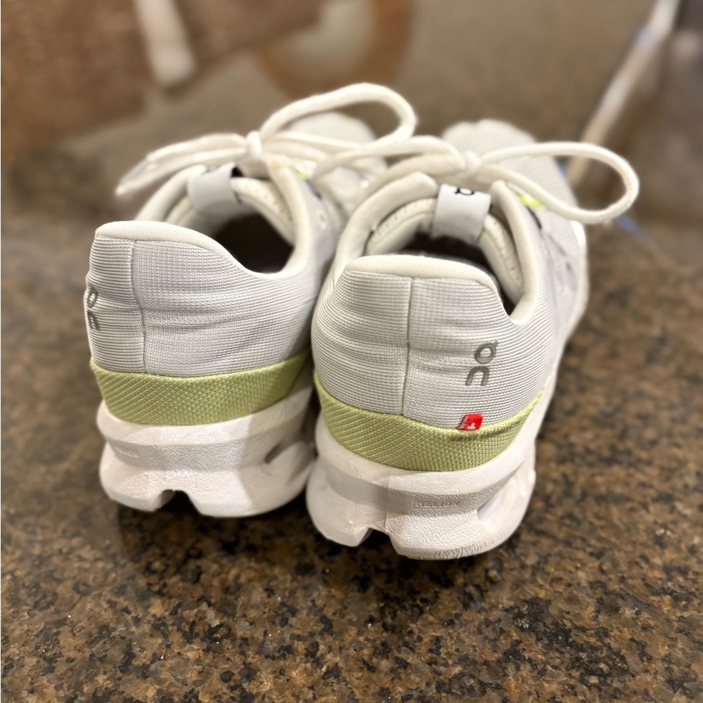 On Running White Sneakers with Light Yellow Accents - Picture 3 of 5